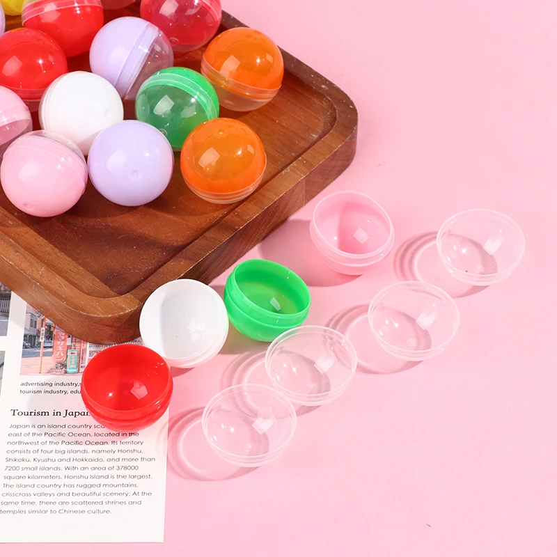 100Pcs 플라스틱 빈 장난감 판매 캡슐 하프 클리어 하프 컬러 라운드 볼