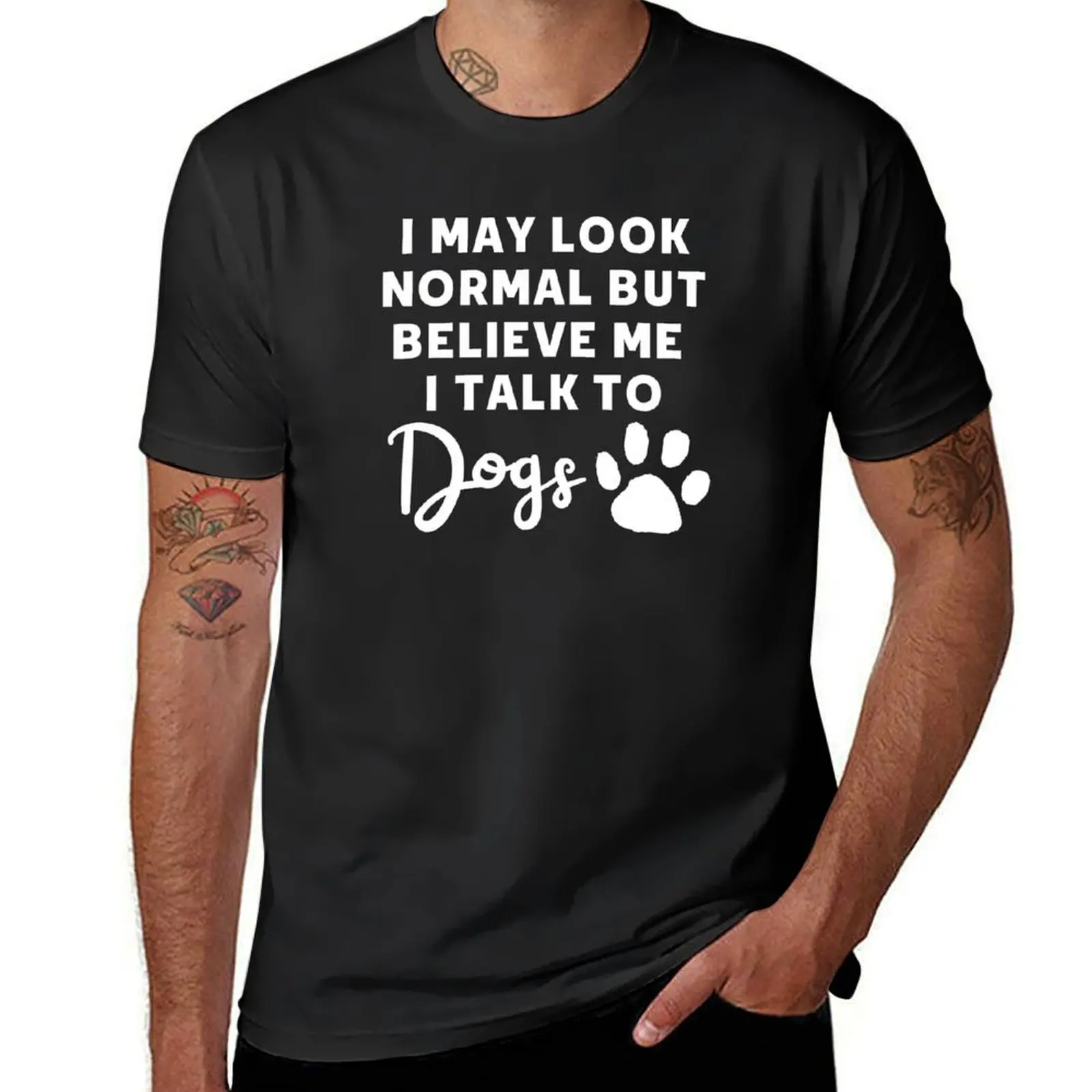 

Dog Owner saying , I May Look Normal But Believe Me I Talk to Dogs - an awesome design for a pet dog lover or a Dog owne T-Shirt