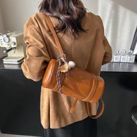 Multifunctional Cylinder Shaped Shoulder Bags For Women 2024 Winter Latest Designer Handbags Luxury Cross Body Bag With Pendant - Image 4