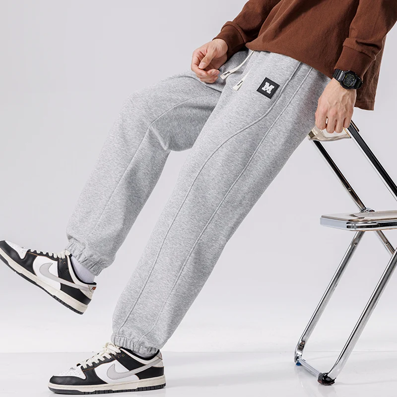 Spring Autumn New Solid Color Fashion Elastic Waist Sweatpants Man High Street Casual Loose Pockets Drawstring Cotton Trousers