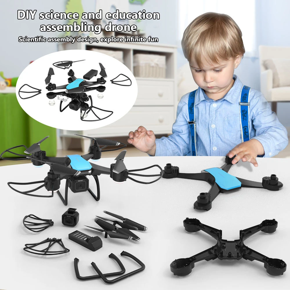Pièces du drone JJRC H108 avec caméra 4K pour assemblage DIY, éparpillées sur une table.