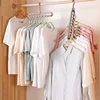 2Pcs/4Pcs  9-in-1 Multifunctional Foldable Reusable Hanger Storage Rack Nine Hole Plastic Hanger For Household Garments 4