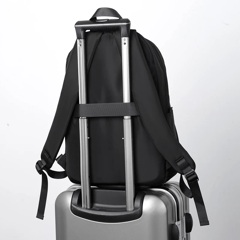 Neutral backpack with laptop compartment, adjustable shoulder strap, commuting bag, smooth texture, travel backpack