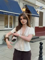 Rétro dentelle profonde col en v chemise femmes Chic solide à lacets boutons chemises minces femme 2025 été polyvalent mode rue hauts 2
