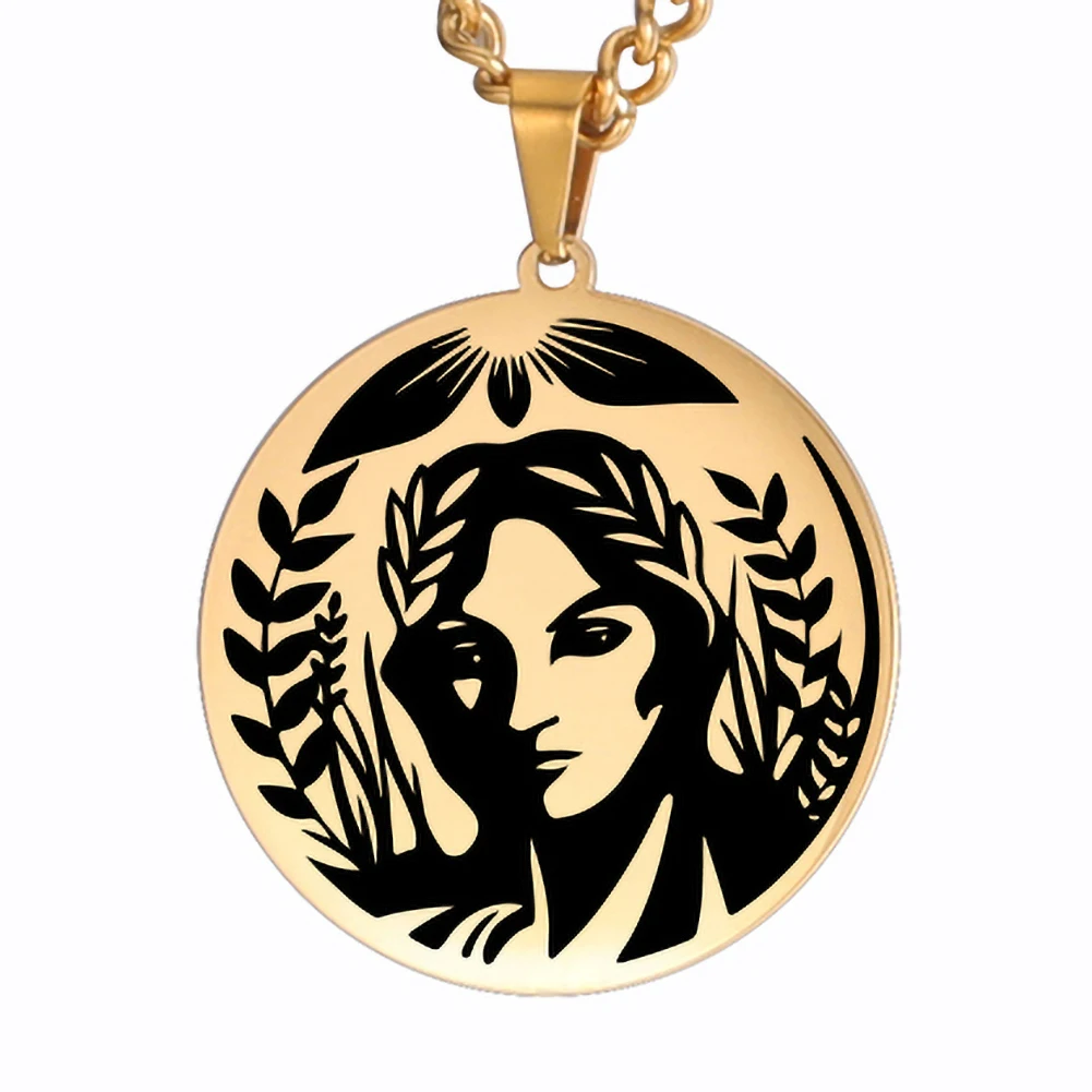 Pendentif Déméter doré entouré de feuilles