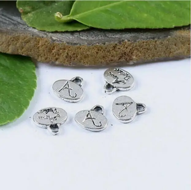 

60pcs 9*9mm Tibetan silver crafted oval charms h1061