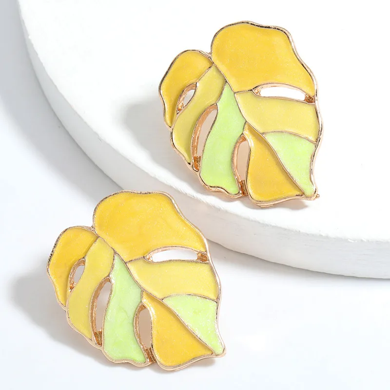 Boho Monstera Earrings up close in yellow