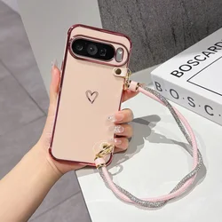Enhanced Plating Hollow Love Phone Case with Lanyard and Wrist Strap - Shockproof Protection for Google Pixel 8 Pro (Pink)
