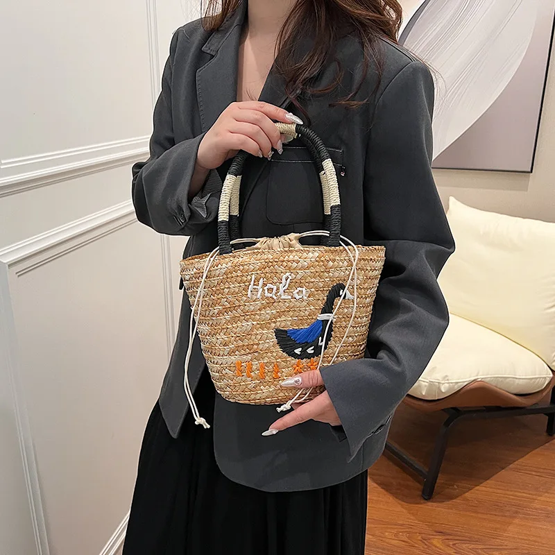 thumbnail image 1 of Bolsa de paja tejida de fábrica transfronteriza Bolsa de ratán Bolsa de mano tejida de paja de gran capacidad Bolso de mano para mujer 2024 Nuevo hecho a mano, 1 of 5