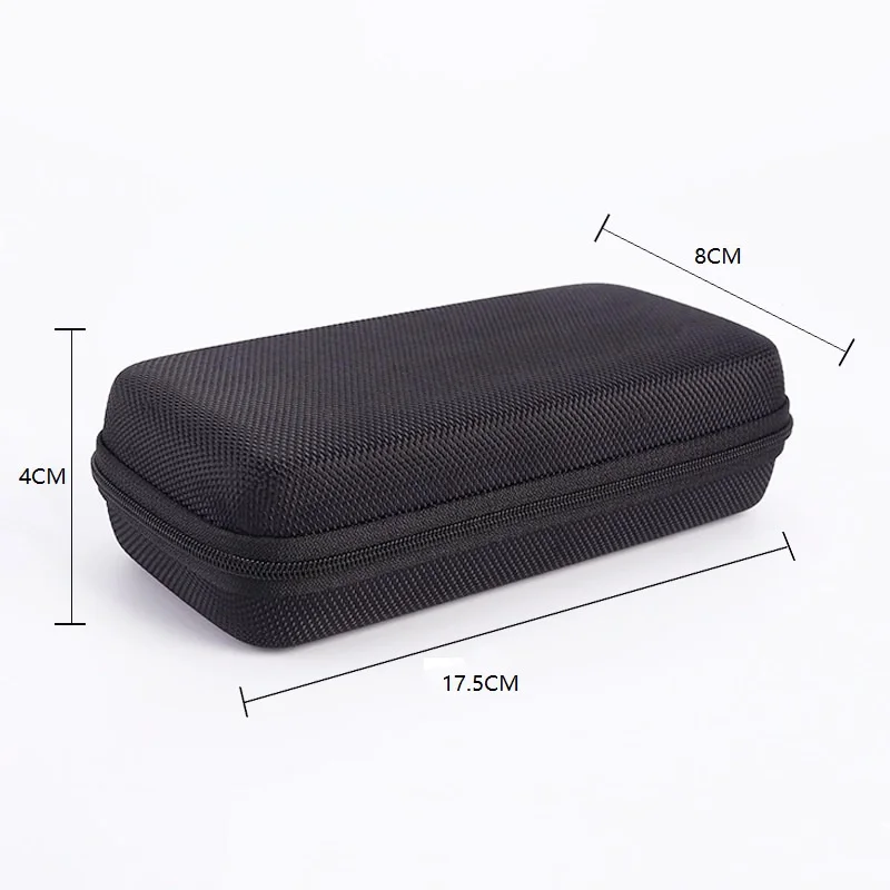 Vue de dessus de l'étui rigide EVA contenant une batterie externe et des câbles USB organisés dans des sangles élastiques.