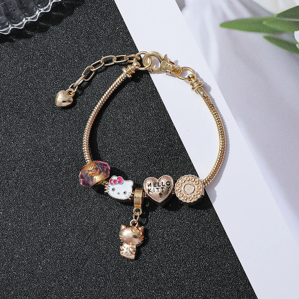 سوار "هيلينا" المطلي بالذهب مع تعليقات "هالو كيتي"...