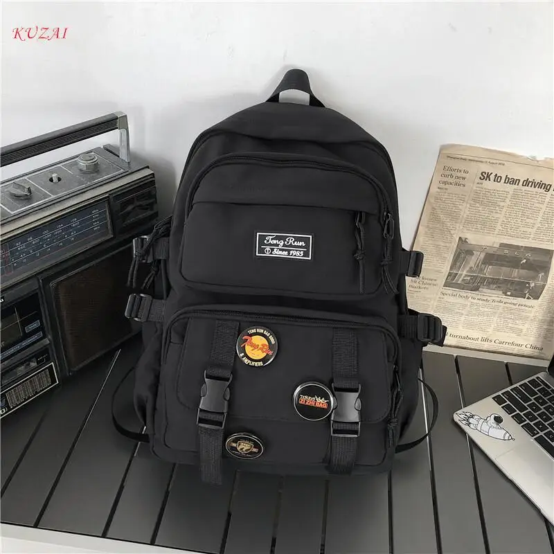 

Водонепроницаемый нейлоновый рюкзак KUZAI с несколькими карманами, вместительный школьный ранец сплошного цвета для женщин и мужчин, сумка для ноутбука с внутренними кнопками