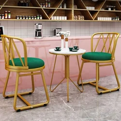 Silla de comedor de Arte de hierro rojo de Red nórdica, tocador creativo minimalista moderno para el hogar, silla de maquillaje con respaldo, mesa y silla de uñas