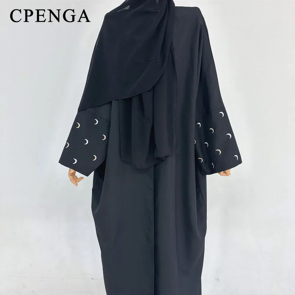 black coat and hijab
