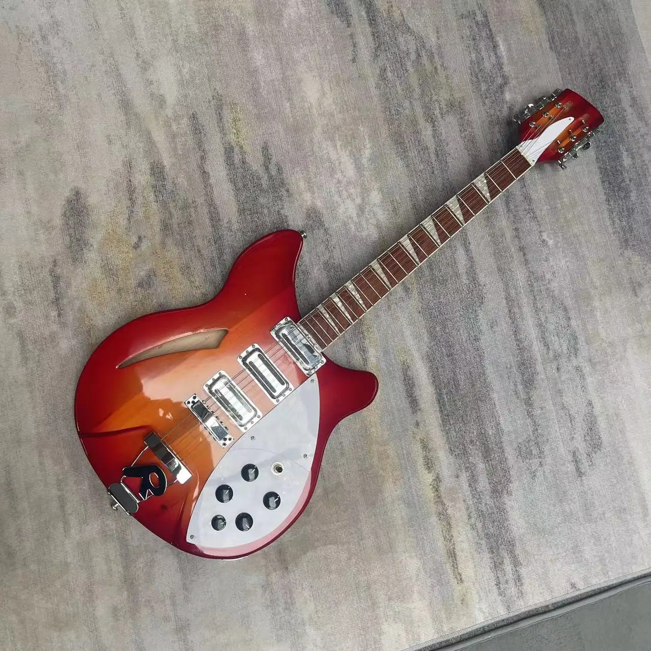 

12 string 360 tomato colored body electric guitar integrated electric guitar, high gloss, dedicated pickup. White protective boa