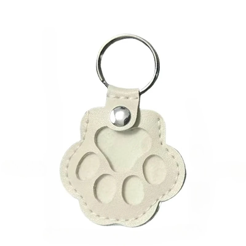 Leather pet hair storage bag with cat paw keychain - image 1
