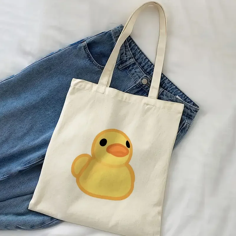 Einfarbige Cartoon-Gummi-Enten-Canvas-Tragetasche, schlichter gelber Enten-Umriss-Print, Handtasche für Kinder, Geschenk, tägliche Freizeit-Einkaufstasche