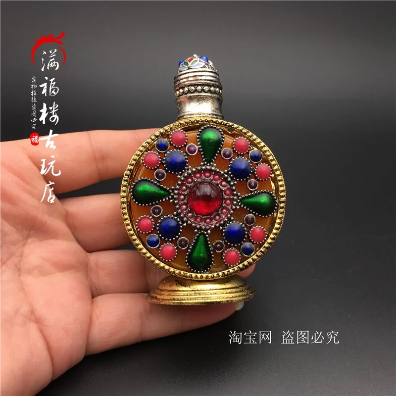 

Miscellaneous collectibles Double sided copper edging honey wax snuff bottle Double sided hollowed inlaid gemstone cigarette