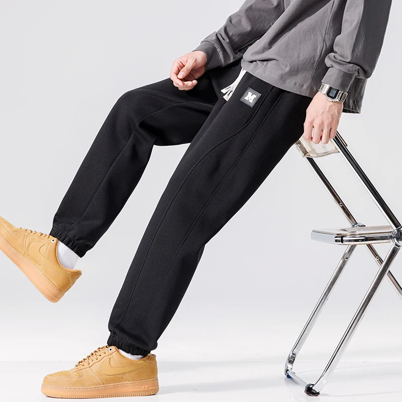 Spring Autumn New Solid Color Fashion Elastic Waist Sweatpants Man High Street Casual Loose Pockets Drawstring Cotton Trousers