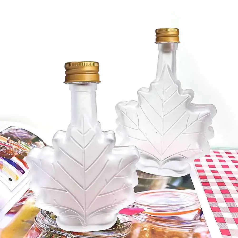 50ml 100ml 250ml Mini Maple Leaf Shape Whisky Alcohol Canning Small Wine Syrup Glass Bottles With Cover For Liquor Scotch