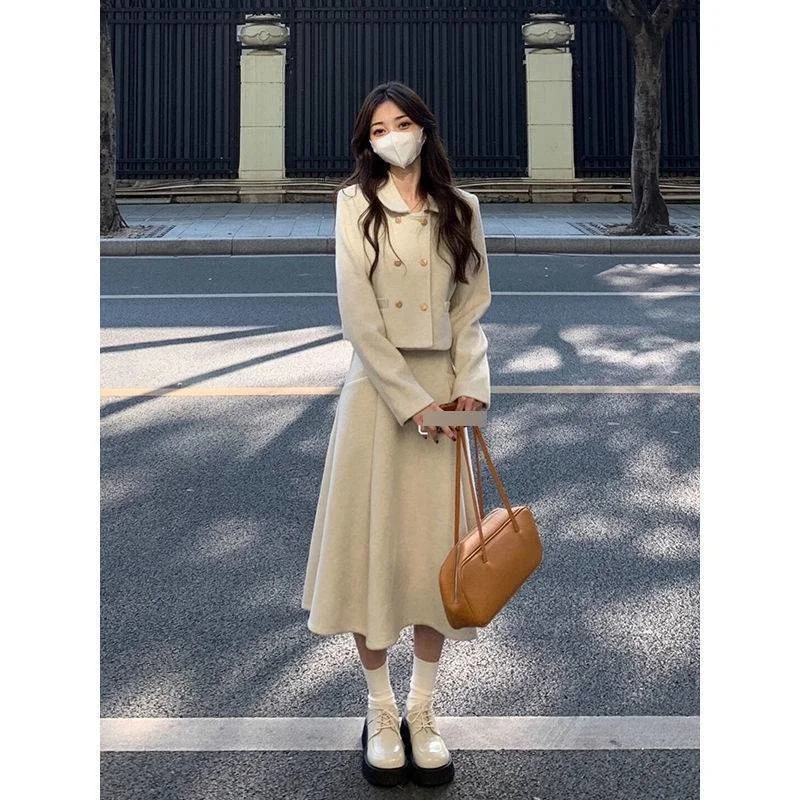 

Skirt children[two-piece]French temperament small fragrance versatile coat + medium and long slim skirt in spring