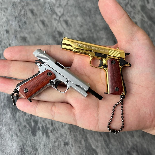 Pistolet l'inventaire anti-stress M1911, mini porte-clés modèle