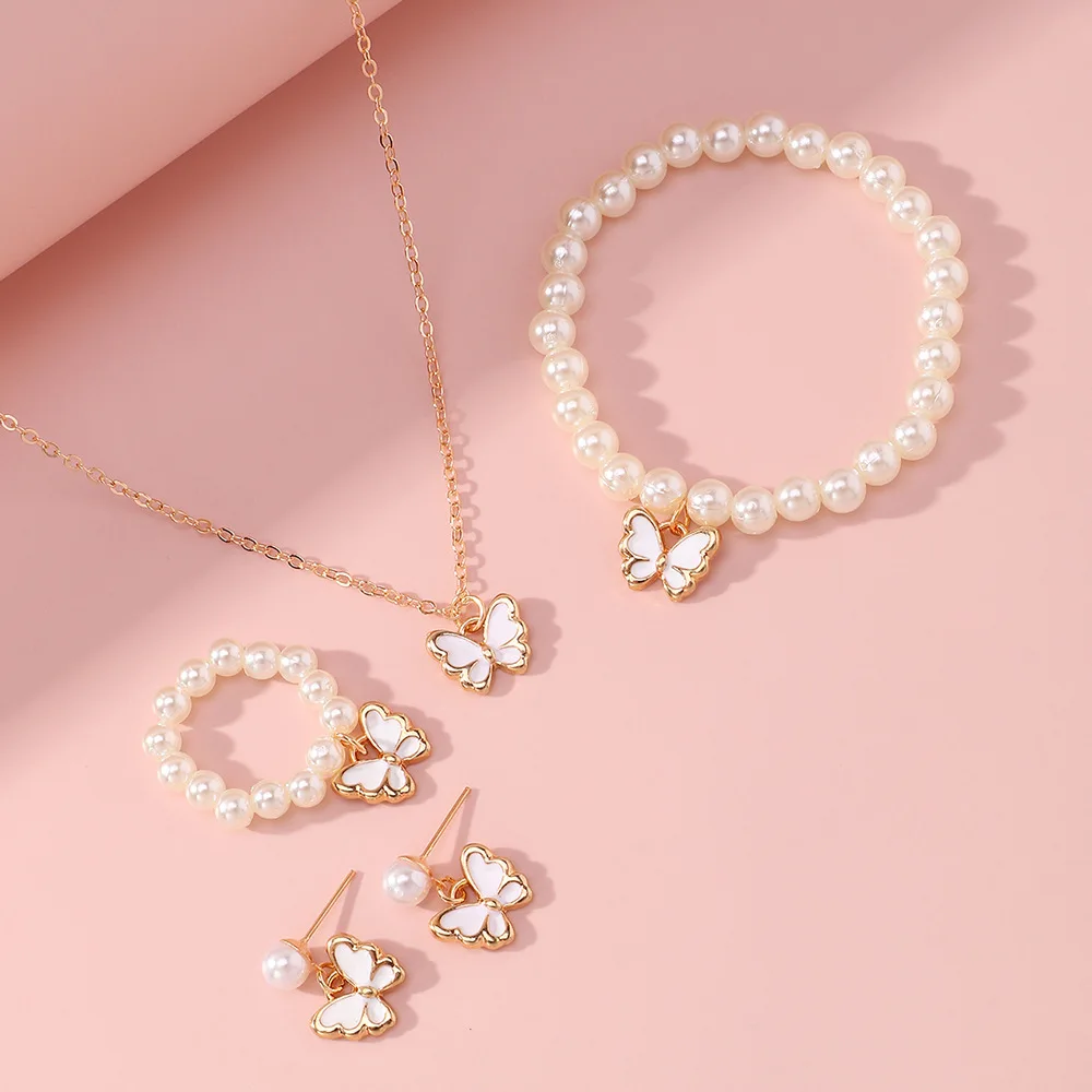 Earrings and ring displayed together