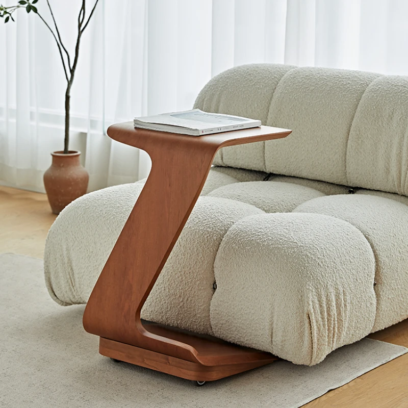 

Original modern mobile sofa with wheels, corner table and small coffee table.