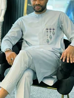 African Kaftan  wear evolution for men: Traditional outfits, dashiki designs, and vibrant fabric choices 1
