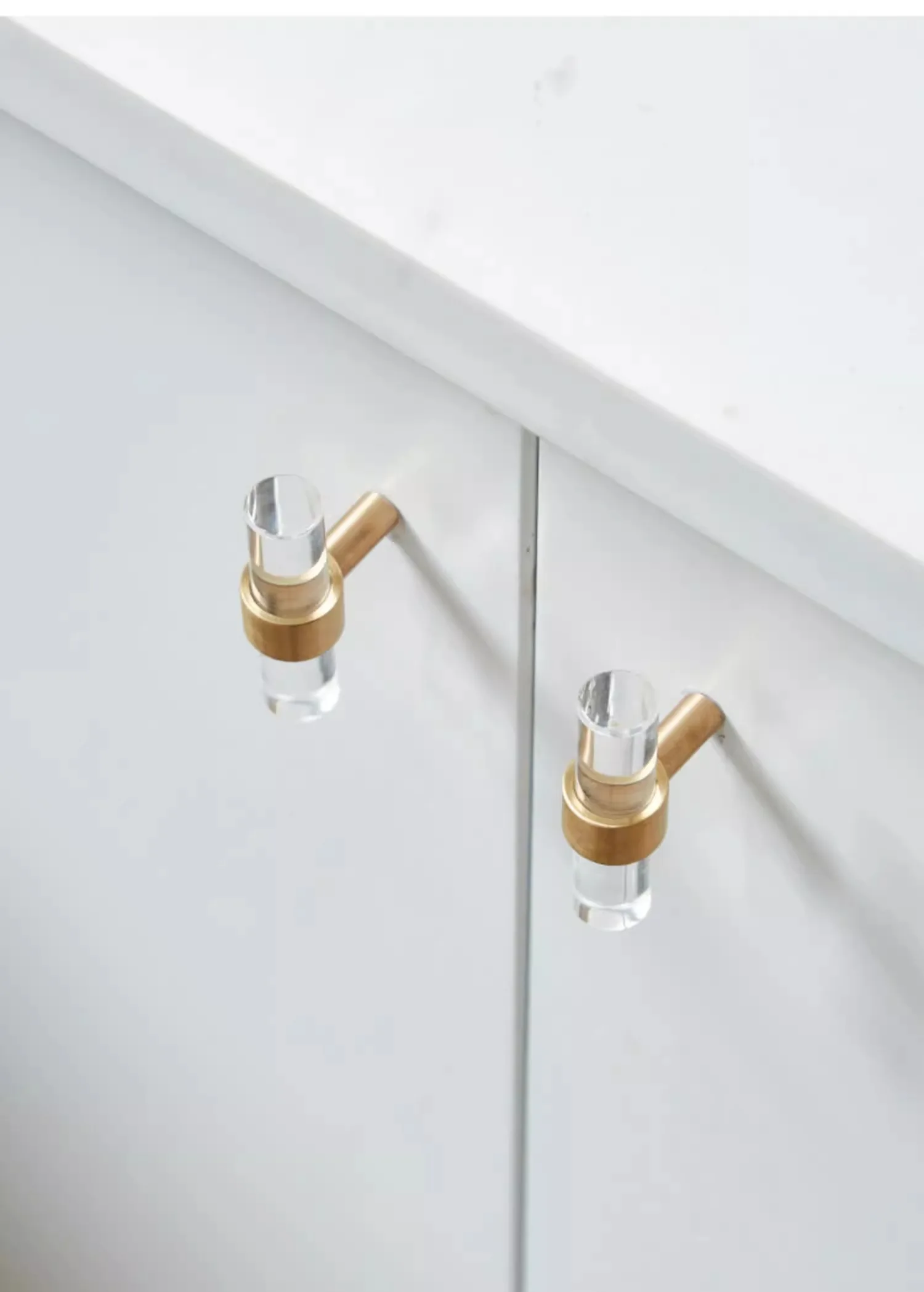 transparent acrylic pull handle brass finish cabinet
