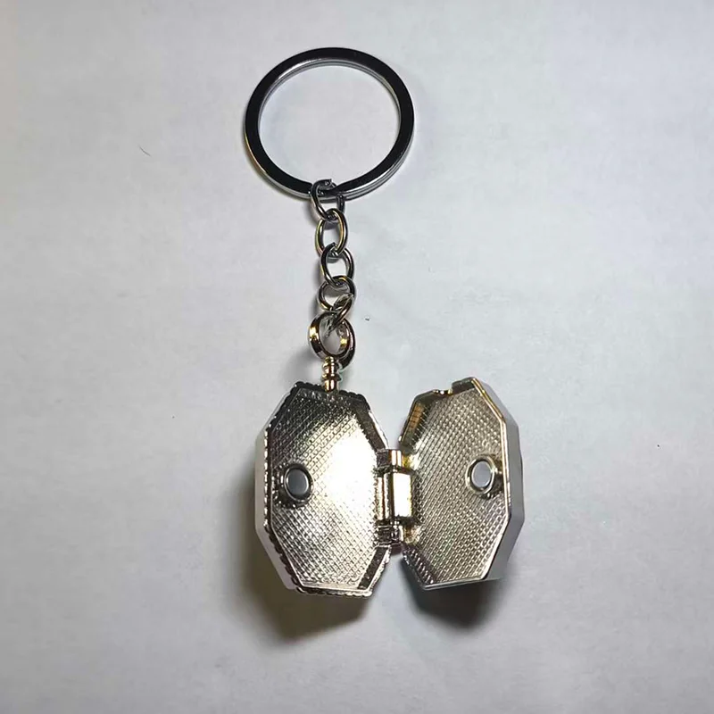 Sparkle Gem Keychain: Multi-Faceted Green/Yellow Crystal with Metal Rim and Unique Anti-Loss Design