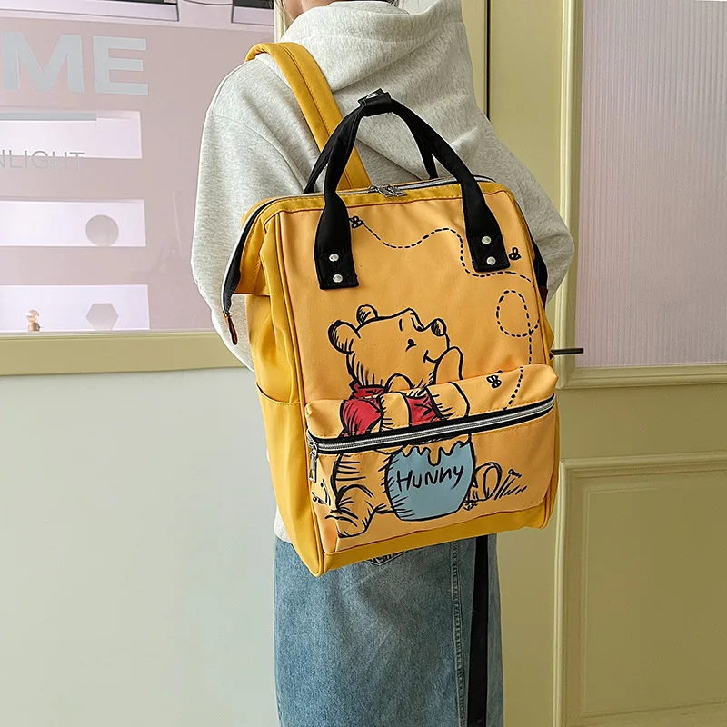Mochila de Disney Winnie Pooh para mujer, bolsa de viaje de gran capacidad, mochila de dibujos animados, regalo escolar para niños