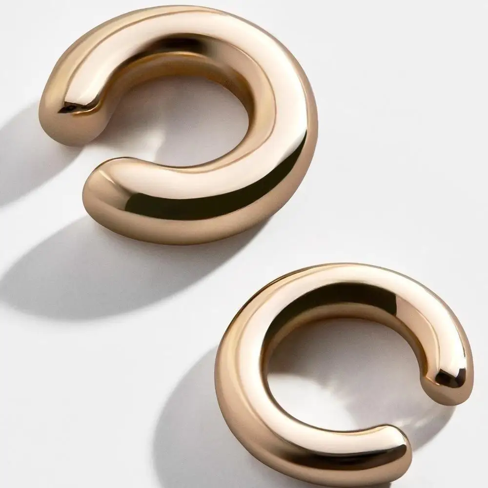 Fake perforated metal ear clip asymmetric circular cartilage Women's ear cuff
