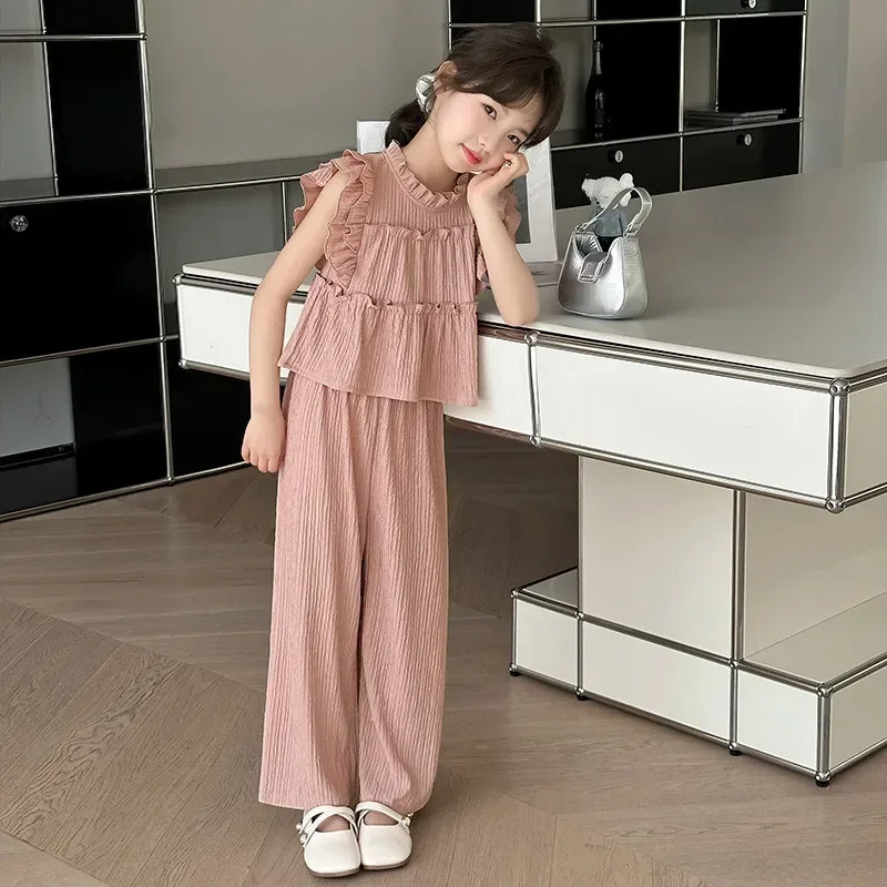 DESIGN - Vestito corto a maniche lunghe color ruggine con volant e scollo a V