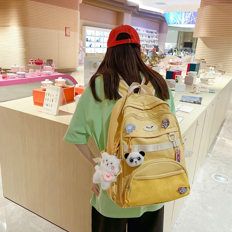 New Cute Girl Mesh Travel Book Backpack Trendy Fashion Women Net School Bag Lady Kawaii Badge College Backpack Female Laptop Bag