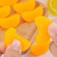 Simulated orange soft rubber slow rebound stress relief gadget for desktop venting. Super realistic fruit-shaped decorative item.