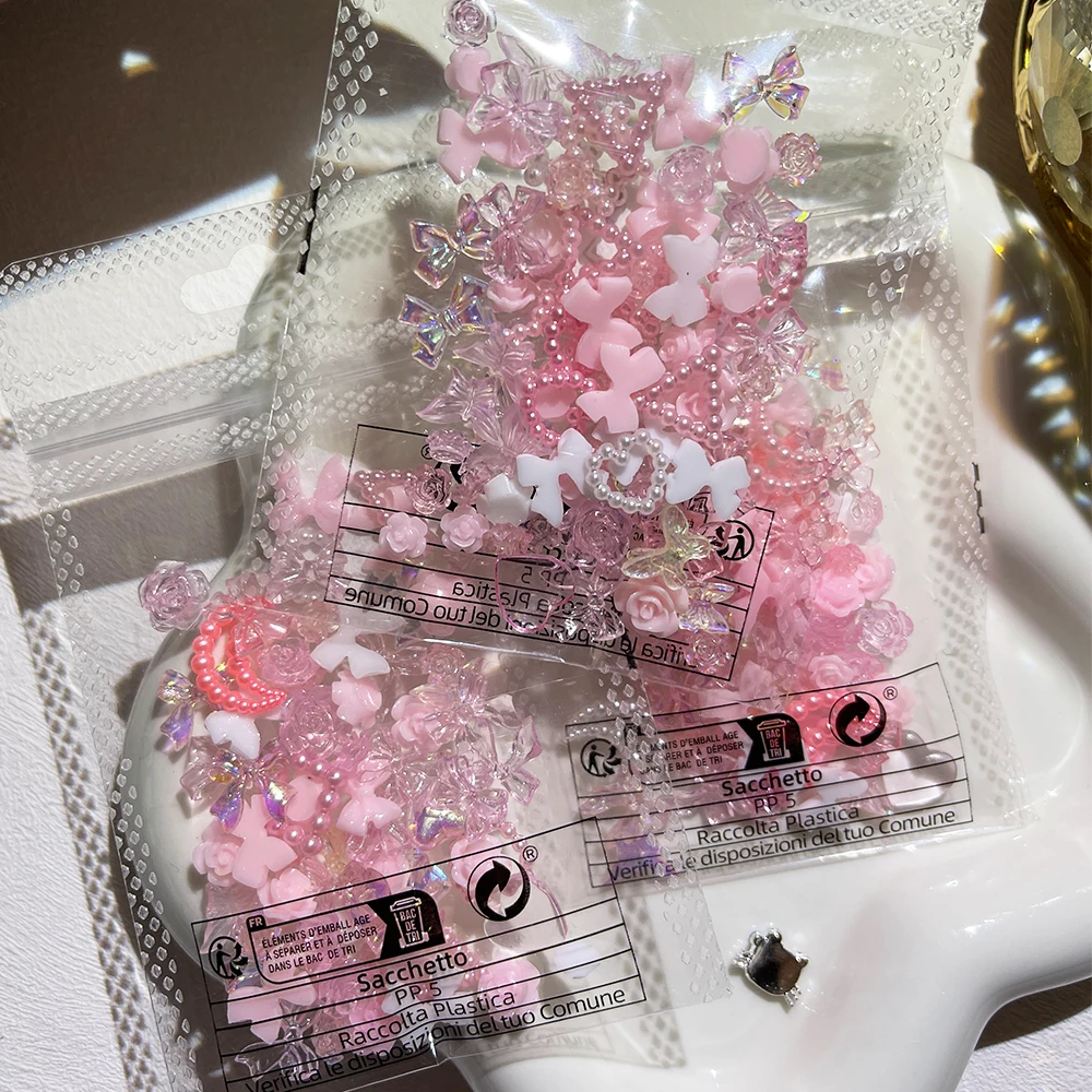 50Pcs 진주 핑크 Bowknot 하트 모양의 라인 석 혼합 네일 장식 Kawaii 꽃 나비 매력 DIY 네일 액세서리