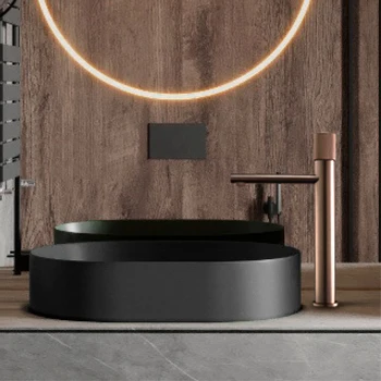 ก๊อกน้ําห้องน้ําทองเหลืองสีดําโต๊ะส้วมล้างมือทรงกลมภายใต้ก๊อกน้ําร้อนและเย็นของโรงแรมระดับไฮเอนด์ 2