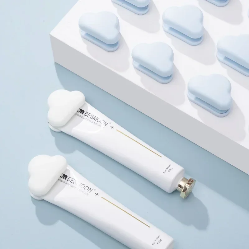 Cute Cloud Toothpaste Holder Hanger Self Adhesive Facial Cleanser Clip Multifunctional Toothpaste Storage Rack Bathroom Supplies toothbrush holder toothpaste dispenser