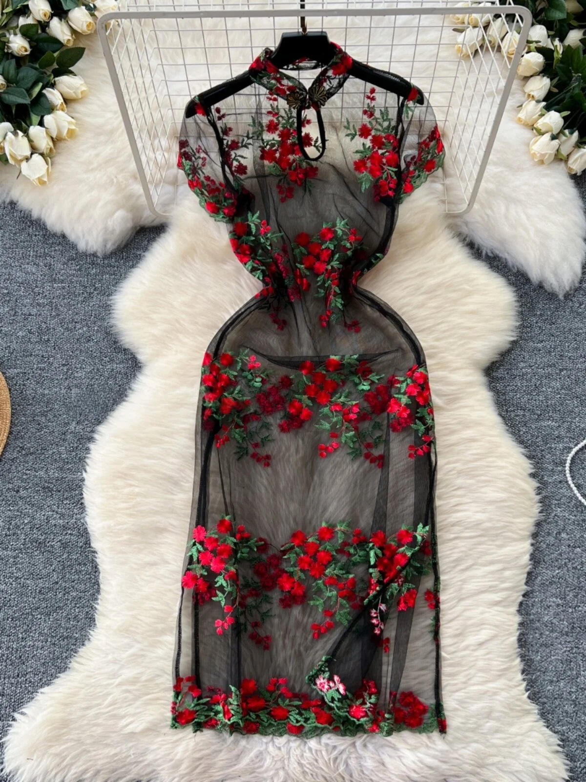 A new women's dress embroidered with flowers from mesh, with a modern and sexy design in Chinese style, with short sleeves and a s...