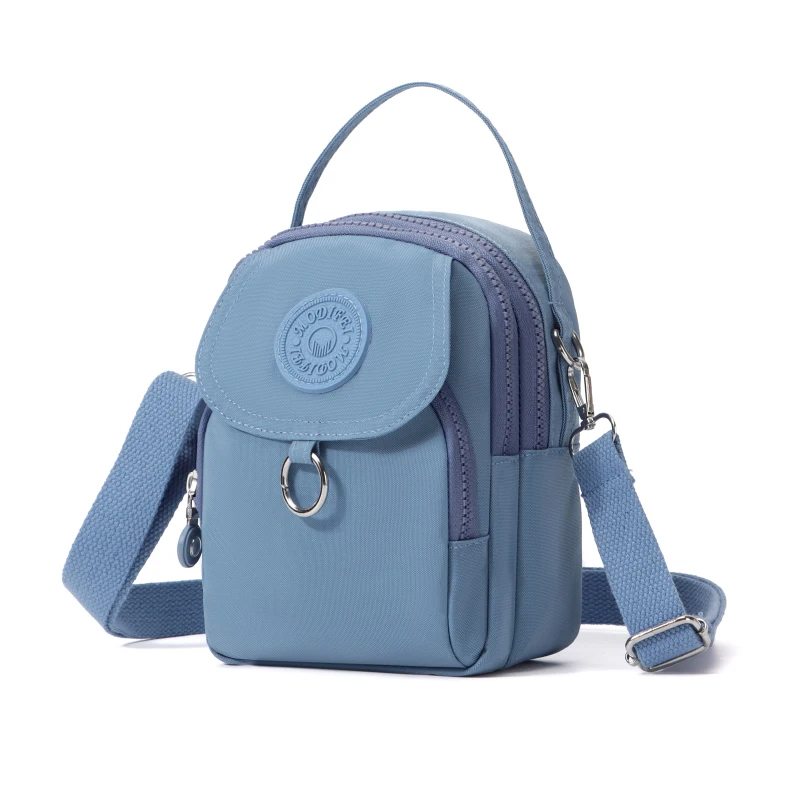 Fashionable women's phone bag with adjustable shoulder straps and multiple zippers - lightweight, durable, and portable - minima