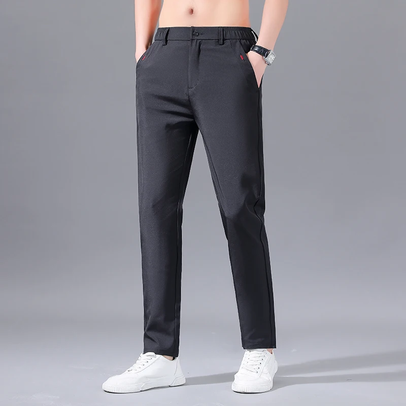Spring Summer New Solid Color Fashion Elastic Waist Pants Man High Street Casual Button Pockets Patchwork All-match Trousers