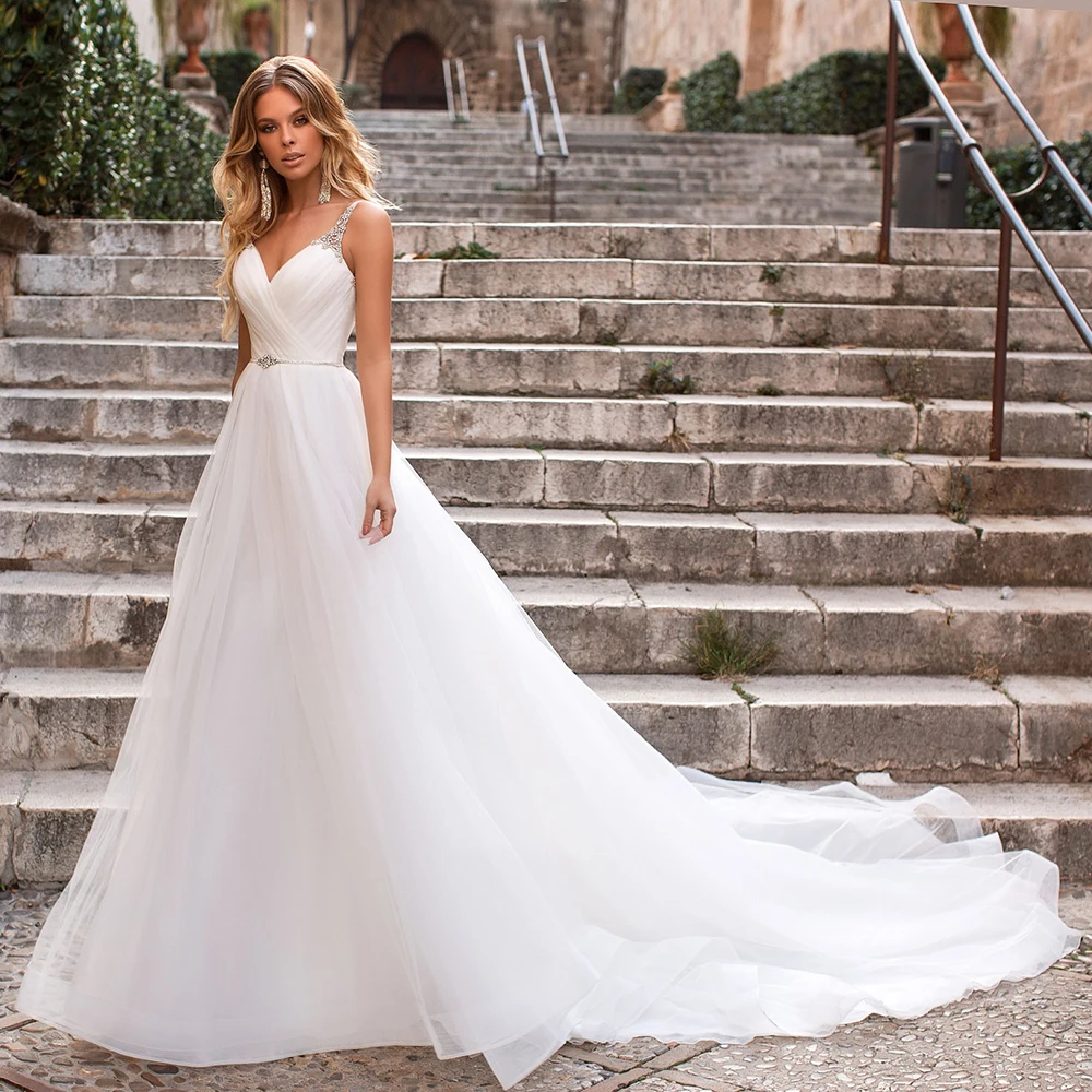 

UZN Elegant Princess Tulle Wedding Dress Robes De Mariée Sweetheart Spaghetti Straps Beading Wedding Gowns Backless Dubai Bridal