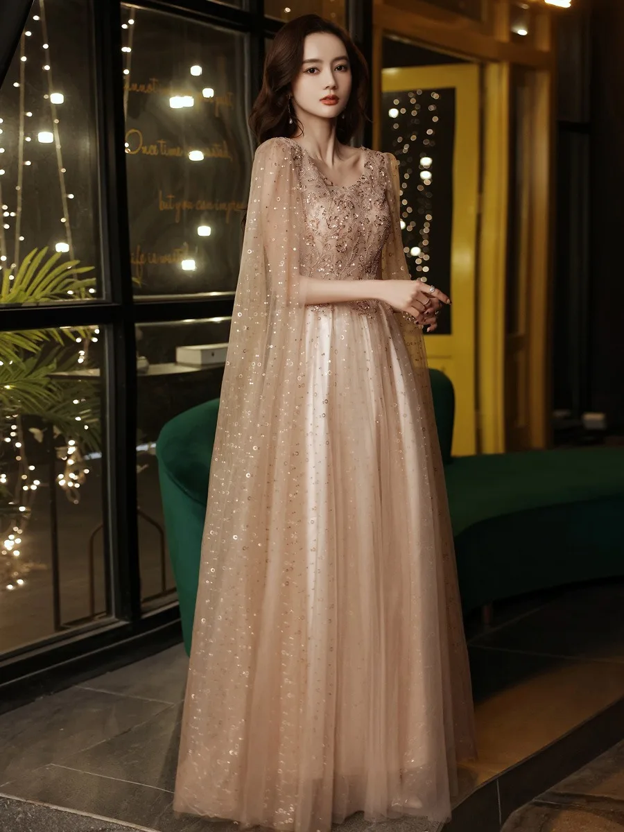 

Khaki Shiny Champagne Celebrity Dresses Shawl Sleeve Beading Backless Ankle Length With Cap New Evening Formal Party Gown 2024