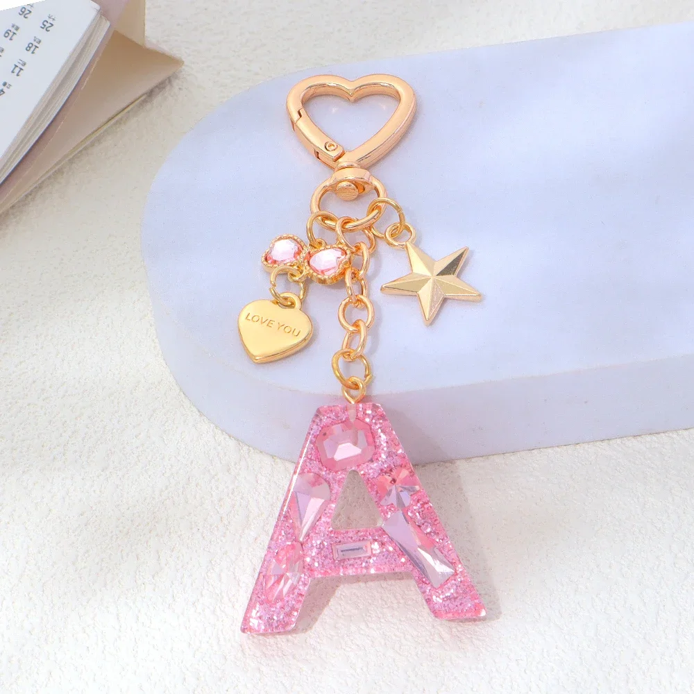 LLavero de 26 iniciales relleno de cristal rosa, llavero con lazo de diamantes de imitación a la moda, llavero con forma de corazón y letras para mujer, llavero con abalorio para bolso, joyería, regalo DIY