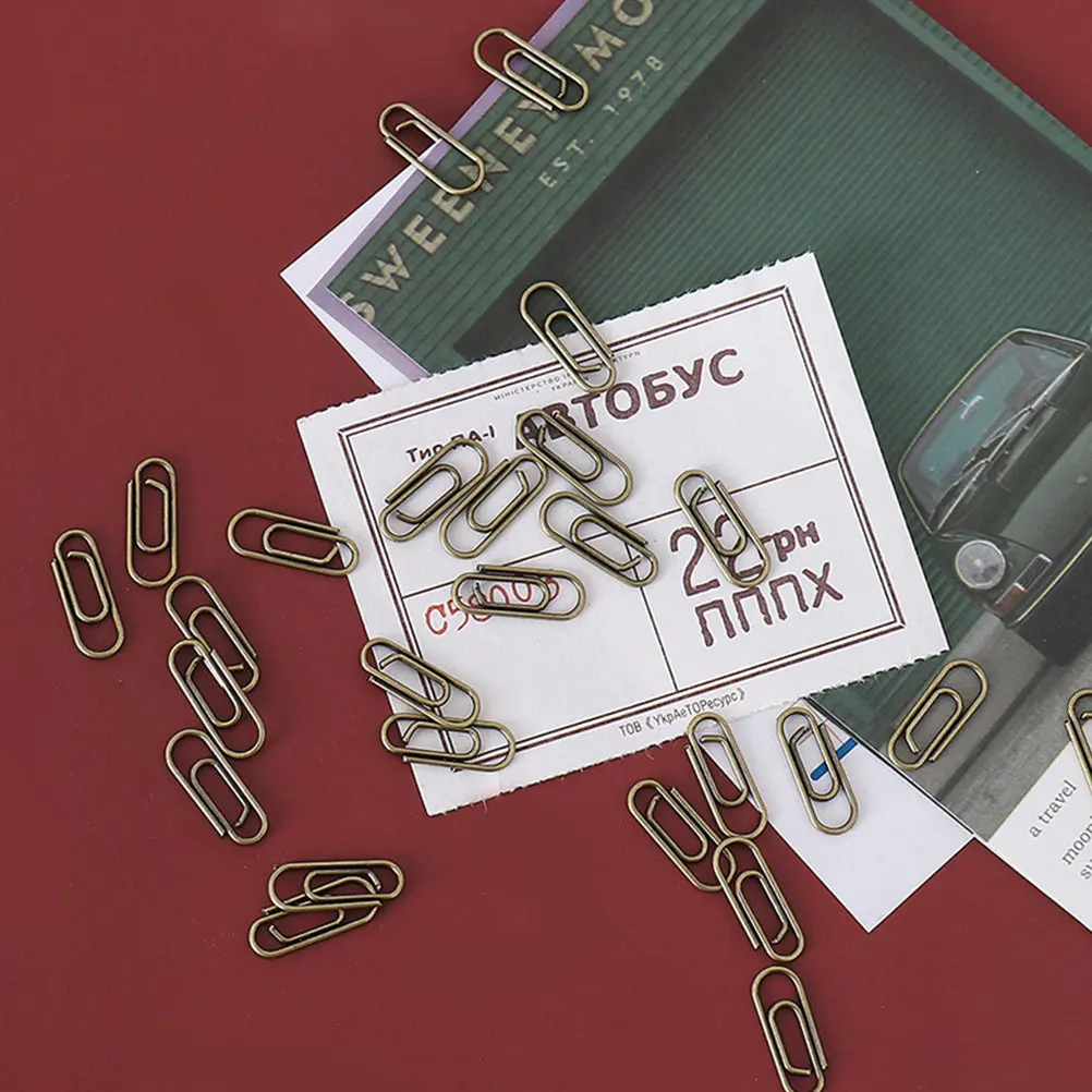 100Pcs 금속 미니 종이 클립 견고한 구조 신뢰할 수있는 클램핑 사무실 학교 문서 파일 클립 레트로 장식 종이 클립