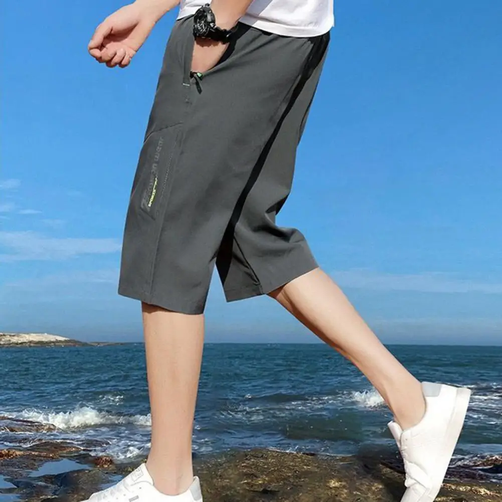 

Men Loose Fit Cropped Pants Breathable Mid-calf Length Men's Cropped Pants with Elastic Waist Zipper Pockets for Comfortable