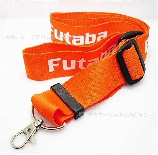 Futaba lanière RC orange ajustable, offrant confort et robustesse pour les passionnés de modélisme.