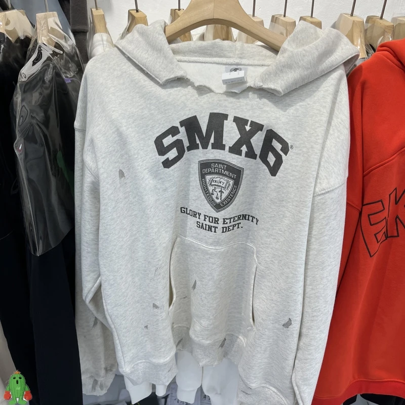 

Real Photos Saint Michael Hoodie Men Women American Vintage Wash Do Old Holes DestroyShield Letter Print SAINT Pullovers