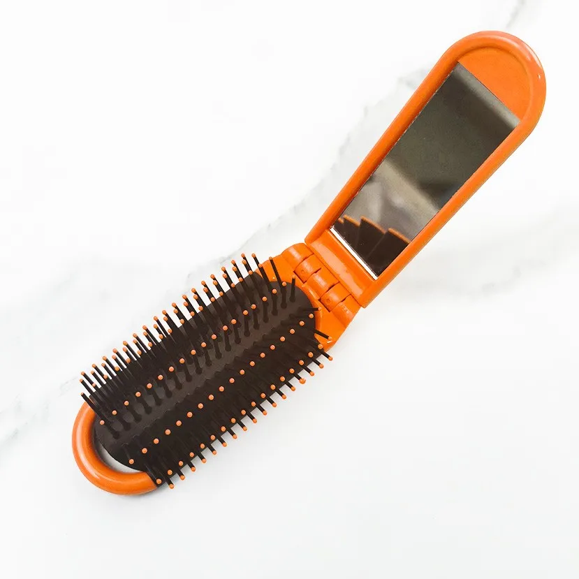 Compact Dual-Use Folding Hair Brush with Mirror - Portable and Heat-Resistant